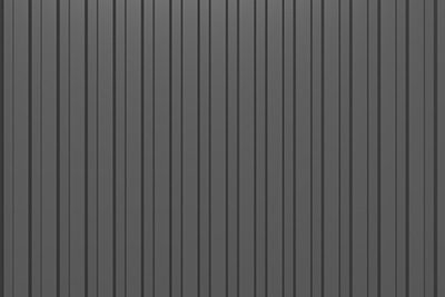 Black corrugated metal texture, dark abstract background. 3d rendering.
